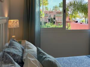 Posteľ alebo postele v izbe v ubytovaní Apartamento Marbella Alicate Beach