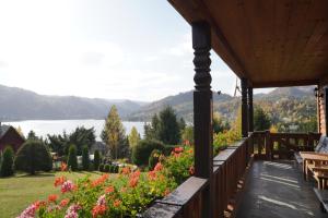a view from the porch of a house with flowers at Montebello Colibita in Colibiţa +68 photos