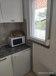 Kuchyň nebo kuchyňský kout v ubytování Apartments Zaton Draga