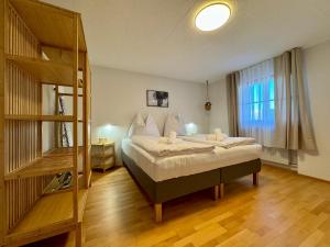 Posteľ alebo postele v izbe v ubytovaní Bauernchalet Alois