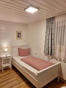 A bed or beds in a room at Piz Buin
