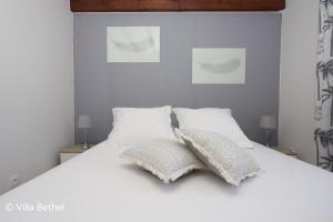 Voodi või voodid majutusasutuse Villa Sweet Caraïbes, vue mer, jacuzzi toas