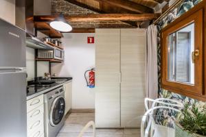 Køkken eller tekøkken på Apartamento Plaza de España 7 + 11 billeder