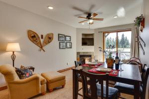 a dining room and living room with a table and chairs at Condo with King Bed 3 Mi to Breckenridge Gondola! in Breckenridge