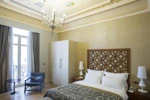 Postel nebo postele na pokoji v ubytování The Story Hotel Pera