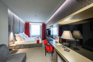 Postel nebo postele na pokoji v ubytování Spa Hotel Ezeretz Blagoevgrad + 37 fotografií