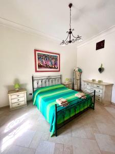 A bed or beds in a room at VILLA GAIA