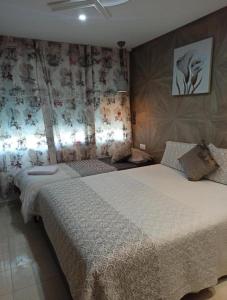 Postel nebo postele na pokoji v ubytování home & room center of rabat