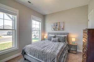 a bedroom with a bed and a window at Lovely Bowling Green Home, 10 Mi to Downtown! in Bowling Green