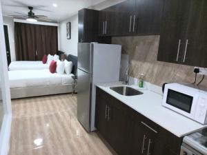 Katil atau katil-katil dalam bilik di Myah's Hotel