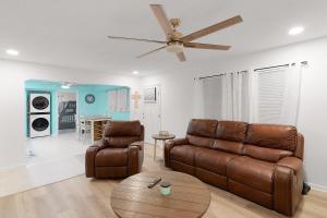 Posezení v ubytování The Turquoise Cottage