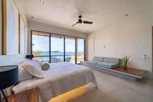 Ένα ή περισσότερα κρεβάτια σε δωμάτιο στο 3023 - Amanecer K3 +34 φωτογραφίες