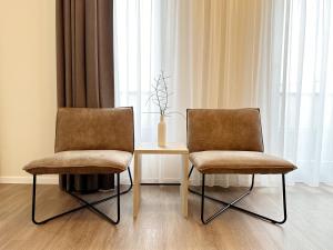 Posezení v ubytování DiMas Hotel Ettenheim - Rust