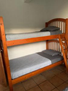 two bunk beds sitting on top of a wall at Million dollar view in Puerto Rico in Luquillo