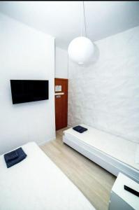 Posteľ alebo postele v izbe v ubytovaní Atlas Hotel