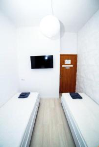 Posteľ alebo postele v izbe v ubytovaní Atlas Hotel