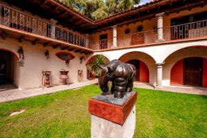 a statue of an elephant in front of a building at Hacienda Tepetlcalli by Rotamundos in Tepeyahualco