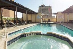 a large swimming pool on top of a building at Drury Inn & Suites San Antonio Riverwalk in San Antonio