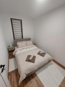 Postel nebo postele na pokoji v ubytování DivčiNova B7 Jovanovic