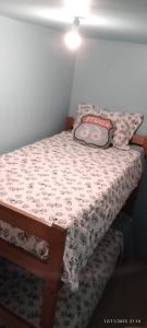 Un pat sau paturi într-o cameră la Departamento Independiente Coronel