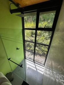 a view of a window in a room at Casa Lanzo, montañas y lago in Macanal