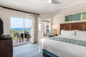 Postel nebo postele na pokoji v ubytování Marriott's Aruba Surf Club