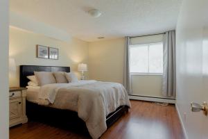 Ένα ή περισσότερα κρεβάτια σε δωμάτιο στο HOMEY 1BR Near NLRHC Corporate Rental WiFi