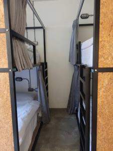 薇薇青旅-嚞驫驛站にあるベッド