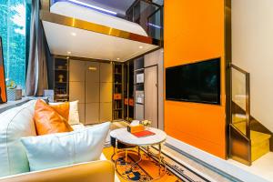 Телевизор и/или развлекательный центр в Yunga Yee Tsui Apartments云嘉倚翠公寓