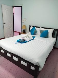 Katil atau katil-katil dalam bilik di Palm Tian Homes A20