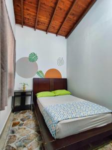 a bedroom with a bed in a room at Lady Mom Hostal in Medellín