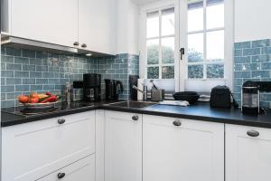 Kuchyň nebo kuchyňský kout v ubytování Haus-Friesenperle + 3 fotografie