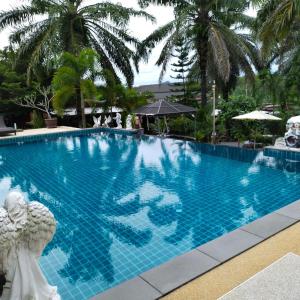 Bazén v ubytování Palm Tian Homes A21 nebo v jeho okolí