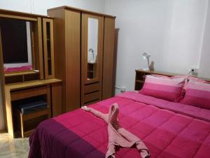 Cama ou camas em um quarto em Baan Sabaijai Viking Home