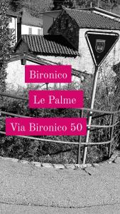 Monte Ceneri的住宿－Le Palme，一种标语,上面写着贝诺娜拉斯帕玛和贝诺塔