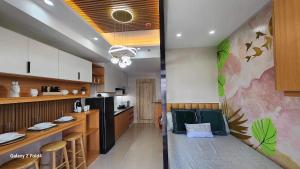 a kitchen with a counter and a dining room at CasaLaila in Davao City