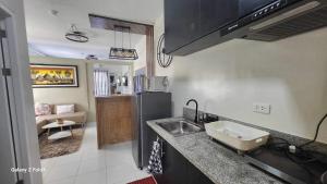 Kuchyň nebo kuchyňský kout v ubytování Veranda Condo + 16 fotografií