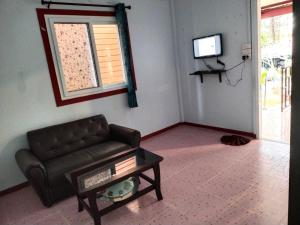 Televisyen dan/atau pusat hiburan di Palm Tian Homes A16