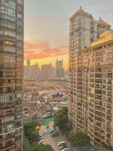 a view of a city with tall buildings at Sun Garden - Near the Bund in Shanghai