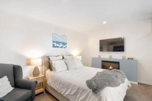 Escape to Coastal Tranquility客房内的一张或多张床位