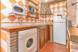 Η κουζίνα ή μικρή κουζίνα στο Casita Frigiliana