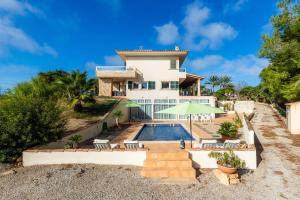 an aerial view of a house with a swimming pool at Villa Salinas de Mallorca in Colonia Sant Jordi