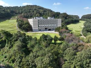 an aerial view of a building on a golf course at The Community A by City College in Goyang