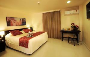 Cama ou camas em um quarto em Bogari Hotel