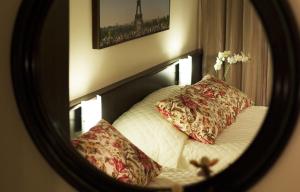 Cama ou camas em um quarto em Bogari Hotel