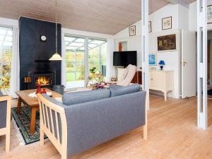 Posezení v ubytování Holiday home Fårvang VII