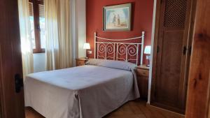 Posteľ alebo postele v izbe v ubytovaní Apartamentos Rurales La Platea