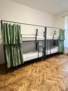 Postel nebo postele na pokoji v ubytování Hostel DO-RE-MI