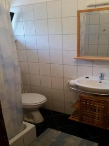 Kúpeľňa v ubytovaní Viktorija Apartments
