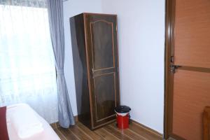 A bed or beds in a room at Hotel Nepal Inn Sauraha- Relax and refresh - A perfect family getaway